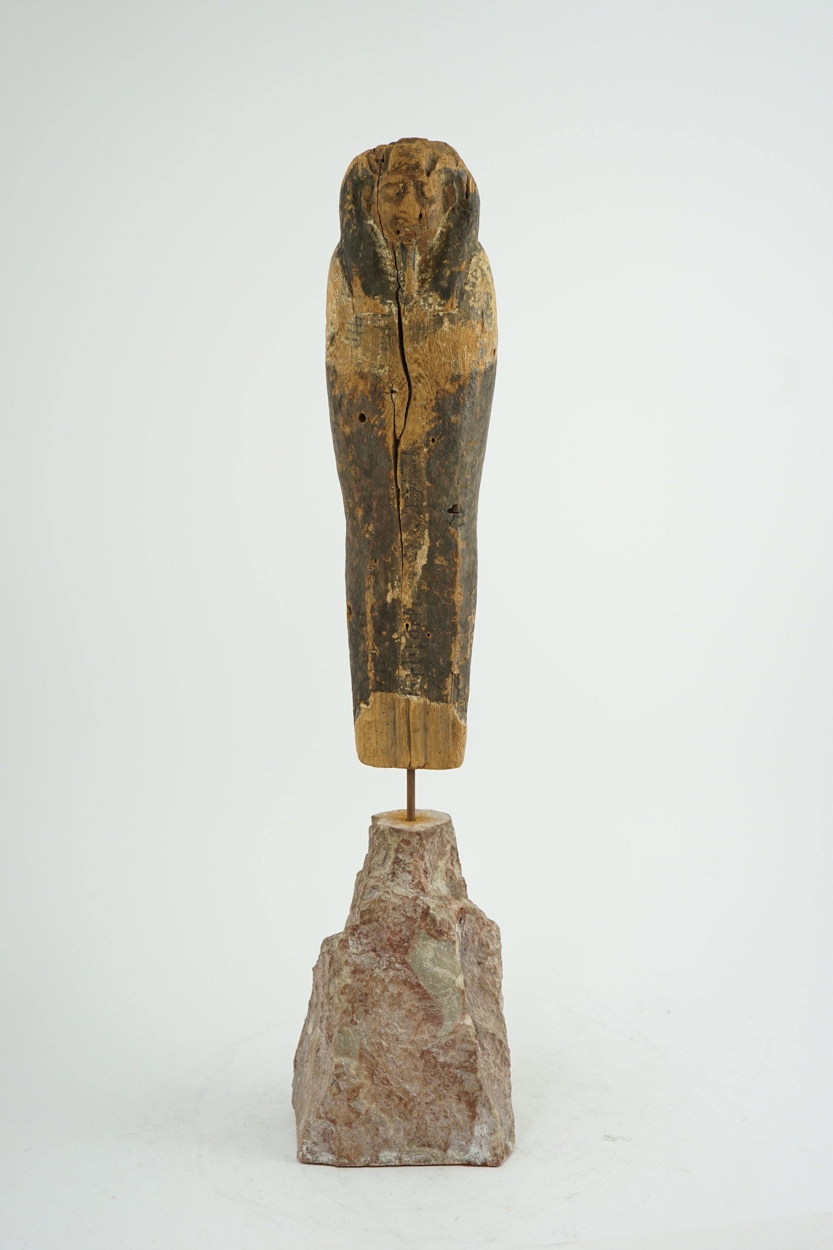 An Ancient Egyptian miniature wood statuette of Ptah-Sokar-Osiris, probably late Kingdom